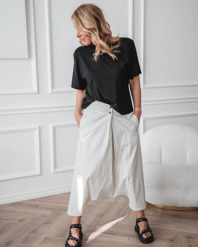 For those who dress with intention.
Not loud. 🖤 Not basic.🖤 Just distinct.🖤
Meet Marui baggy pants and Kami skirt – white with fine black stripes, and a quiet confidence that speaks for itself. A summer piece for the ones who know exactly what they like. @justmust.eu  #naturallyyou #effortlesselegance #boldandedgy #summerwardrobe #estoniandesign #happywithjustmust #justmustbyewi #fashionintallinn